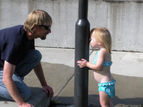 A Father's Day Love Story: Daddy playing hide and seek behind a pole