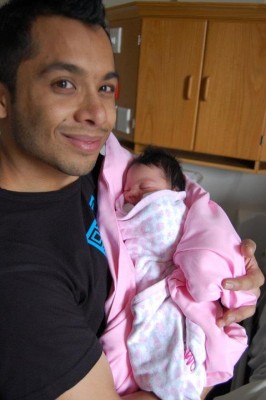 One Man's Dream of Fatherhood: Aslam with Baby Aliya, a few hours after she was born