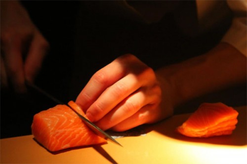 The Dream Process salmon cutting photographed by Andy Chou