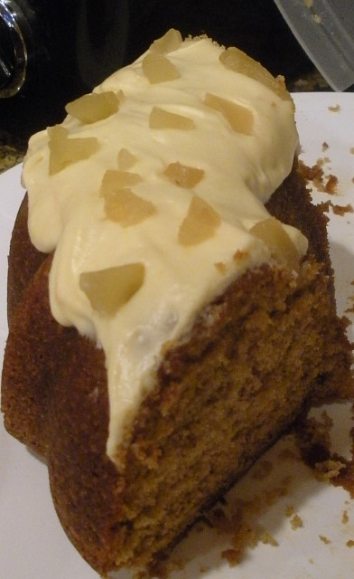 Cranberry pumpkin cake with pumpkin cream cheese and candied ginger frosting.