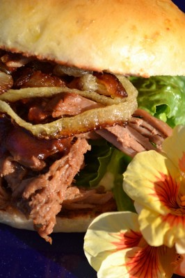 <center><em>Barbecue pulled pork slider with caramelized onions, tarragon, spicy hot mayonnaise on homemade sweet potato buns</em></center>