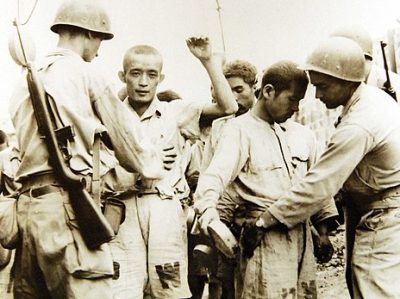 Memorial Day Dream Honoring the Fallen Vets - WWII Japanese prisoners of war under direction of military police in the Philippines