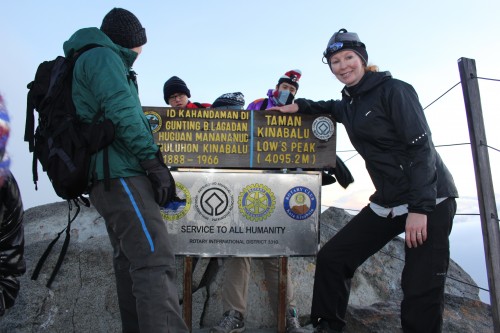 Finding my blogging niche: What kind of a traveler am I? Natasha at summit of Mt Kinabalu