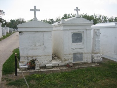 St. Bernard Louisiana after Hurricane Katrina: Terre aux Boeufs Cemetery; damaged above ground tombs with lines showing long standing flood water