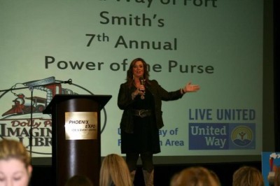 8 Ways Your Headshot Could Be Costing You - Motel 6 presentation photo of Kelly Swanson on Stage