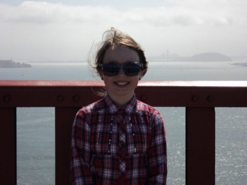 Wild American Dream Family Vacation: My daughter crossing the Golden Gate bridge